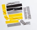 Set scotch tape colorful gray yellow black, sticky tape cut on white background. Royalty Free Stock Photo