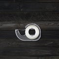 Scotch tape dispenser isolated on black wood background Royalty Free Stock Photo