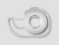 Scotch tape dispenser isolated on grey background