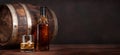 Scotch whiskey bottle, glass and old barrel Royalty Free Stock Photo