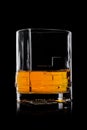 Scotch whiskey in crystal modern glass on black background Royalty Free Stock Photo