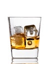 Scotch whiskey in glass with ice cubes on white Royalty Free Stock Photo