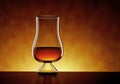 Scotch Whisky, bourbon or rum in a Glass on amber background - 3D Illustration Royalty Free Stock Photo