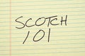 Scotch 101 On A Yellow Legal Pad Royalty Free Stock Photo