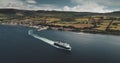 Scotland, Brodick Ferry Terminus aerial panorama shot of ship crossing, Arran Island. Scottish scape Royalty Free Stock Photo