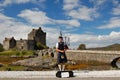 Piper at the Eilean Donan