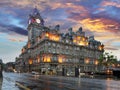 Scotland - Edinburgh at sunset on Princess street and Balmoral hotel on background Royalty Free Stock Photo