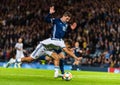 Scotland national football team midfielder Kenny McLean against Russia midfielder Ilzat Akhmetov