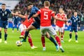 Scotland national football team winger Oliver Burke against Russia defender Andrey Semenov