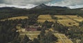 Scotland`s landscape aerial shot: mountains Goatfell, ancient Brodick Castle. Scottish landmarks Royalty Free Stock Photo