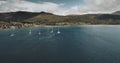 Scotland`s sailboats ocean seascape aerial view in coastal water of Brodick Bay. Ships and boats Royalty Free Stock Photo