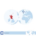 Scotland on world globe with flag and regional map of Scotland Royalty Free Stock Photo