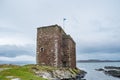 Scotlands Saltire Flag Flying High on Top of One of Scotlands Historic Castle Ruins the SNP`s sign of Independance for Scotland Royalty Free Stock Photo