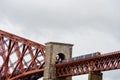 A ScotRail train travels over the Forth Rail Bridge. Strike action by rail unions is expected