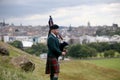 Scottish Bagpiper playing music with bagpipe at Edinburgh in Scotland 19 07 2019 Royalty Free Stock Photo