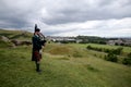 Scottish Bagpiper playing music with bagpipe at Edinburgh in Scotland 19 07 2019 Royalty Free Stock Photo