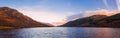 Scottish beautiful colorful sunset landscape with Loch Voil, mountains and forest at Loch Lomond & The Trossachs National Park Royalty Free Stock Photo