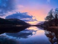 Scottish beautiful colorful sunset landscape with Loch Voil, mountains and forest at Loch Lomond & The Trossachs National Park Royalty Free Stock Photo