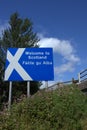 Scottish border sign in English and Gaelic. Royalty Free Stock Photo