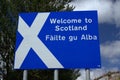 Scottish border sign in English and Gaelic. Royalty Free Stock Photo