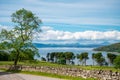 Scottish country road with stone wall,leading to Applecross village,Highlands of Scotland,UK