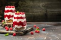 Scottish dessert whipped cream, roasted oatmeal and raspberries in jar. banner, menu, recipe place for text, top view