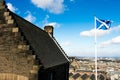 The scottish flag in the wind, looking from Edinburgh Castle