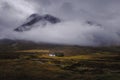 Scottish highlands landscape with white cottage in glencoe Royalty Free Stock Photo