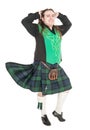 Scottish man in traditional national costume with blowing kilt Royalty Free Stock Photo