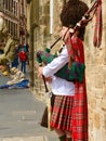 Scottish Piper and Bagpipes Royalty Free Stock Photo