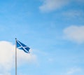 Scottish Saltire flag on a background of blue sky