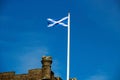 Scottish Saltire Flag Flying Over a Scottish Castle