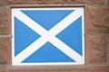 Scottish Saltire flag painted on wall.