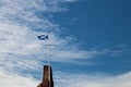 Scottish Saltire Flag Flying Over a Scottish Castle Ruin