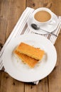 Scottish shortbread on a plate and cup of black tea Royalty Free Stock Photo