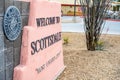 Scottsdale, Arizona, USA - 3.23.2024: Entrance sign on city boundary with desert plants. Royalty Free Stock Photo