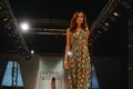 SCOTTSDALE,AZ-OCTOBER 3,Models showcasing designs