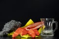 Scouring sponge foaming gloves and yellow cleaning cloth. In black background. Close up. Royalty Free Stock Photo