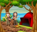 Scout boy and girl in explorer outfit camping out in nature Royalty Free Stock Photo