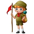 Scout boy holding red flag