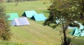 Scout camp with many tents in mountains