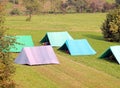 Scout meeting with tents on the hill during summer camp