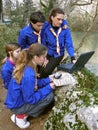 Scouts with laptop Royalty Free Stock Photo