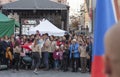 Scouts making the three-finger salute on celebration of Velvet Revolution