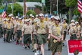 Uniformed boys scouts of USA members walk in formation