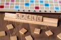 Scrabble board game with the scrabble tile spelling `Spell` Royalty Free Stock Photo