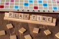 Scrabble board game with the scrabble tile spell `Play Time` Royalty Free Stock Photo