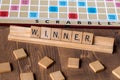 Scrabble board game with the scrabble tile spelling `Winner` Royalty Free Stock Photo