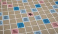 Scrabble gameboard closeup view making background Royalty Free Stock Photo