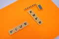 Scrabble tiles arranged PLUS & ANPR on an orange background Royalty Free Stock Photo